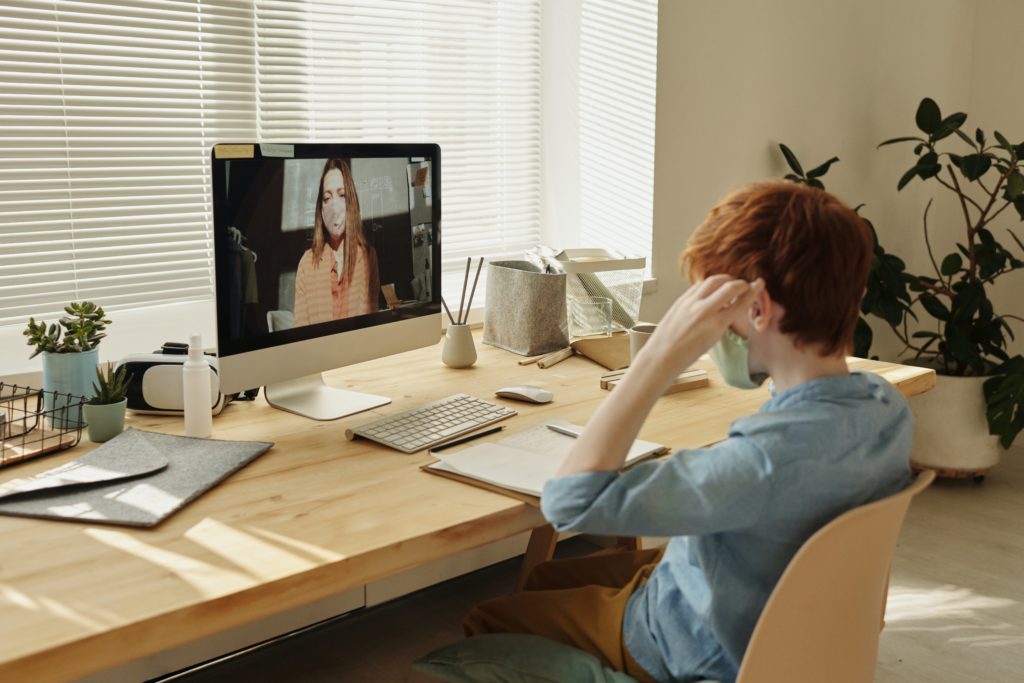 photo-of-boy-watching-through-imac-4145243